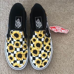 Vans Black and White Checkerboard Slip-On Sneakers